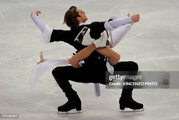 Georgian Allison Reed and Otar Japaridze perform during an ice dance figure skating training session on February 20, 2010 at the Pacific Coliseum in...