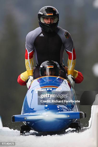 Germany 2 complete heat 3 during the men's four man bobsleigh on day 16 of the 2010 Vancouver Winter Olympics at the Whistler Sliding Centre on...