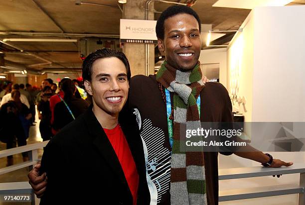 Speedskaters Apolo Anton Ohno and Shani Davis pose together at USA House on February 26, 2010 during the Olympic Winter Games in Vancouver, Canada.