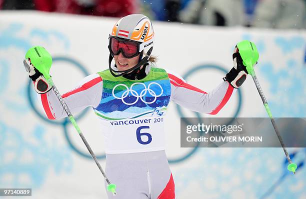 Austria's Marcel Hirscher reacts in the finish area during the men's slalom race of the Vancouver 2010 Winter Olympics at the Whistler Creek side...