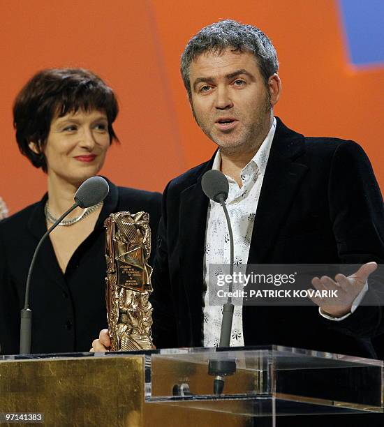 Stephane Brize gives a speech near Florence Vignon after they received the award of the best adaptation during the 35th Cesars French film awards...