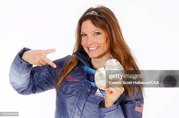Olympic Alpine Skier Julia Mancuso of the United States with her two silver medals won in the ladies downhill and super combined events at the 2010...