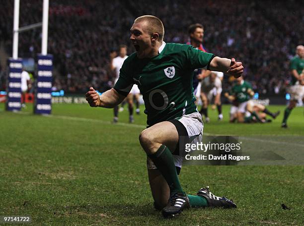 Keith Earls of Ireland celebrates as he scores their second try during the RBS Six Nations match between England and Ireland at Twickenham Stadium on...