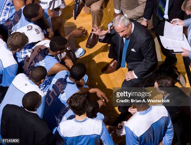 North Carolina Tar Heels head coach Roy Williams talks to his team during a timeout against the Wake Forest Demon Deacons on February 27, 2010 in...