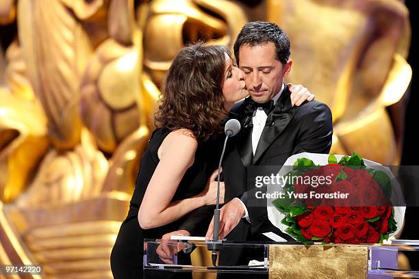 Hosts Valerie Lemercier and Gad Elmaleh perform onstage during the 35th Cesar Film Awards held at Theatre du Chatelet on February 27, 2010 in Paris,...