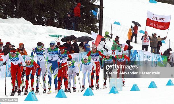 Justyna Kowalczyk of Poland leads the pack during the ladies' 30 km mass start cross-country skiing classic on day 16 of the 2010 Vancouver Winter...