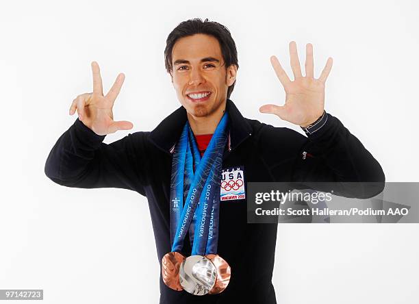 Olympic short track speed skater Apolo Anton Ohno of the United States with his two bronze medals for the men's 1000m and men's 5000m relay and...