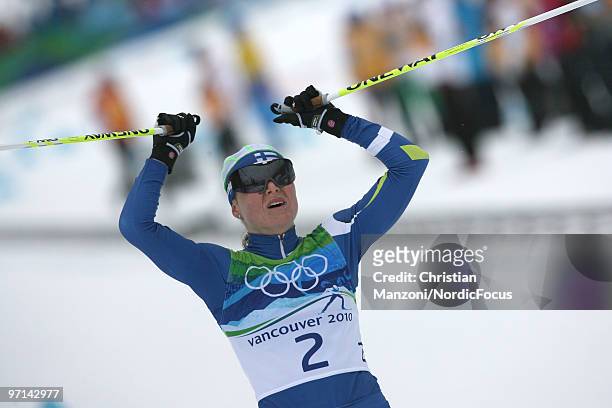 Aino Kaisa Saarinen of Finland celebrates her bronce medal in the women's 30km mass start at the Olympic Winter Games Vancouver 2010 cross country on...