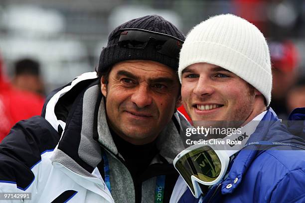 Winner of the Men's Slalom gold Giuliano Razzoli of Italy poses with Alberto Tomba after the Men's Slalom second run on day 16 of the Vancouver 2010...