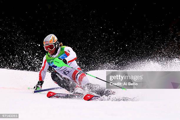 Marcel Hirscher of Austria competes during the Men's Slalom second run on day 16 of the Vancouver 2010 Winter Olympics at Whistler Creekside on...