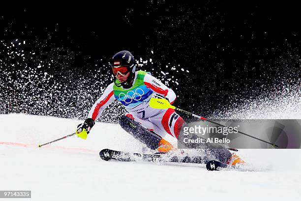 Reinfried Herbst of Austria competes during the Men's Slalom second run on day 16 of the Vancouver 2010 Winter Olympics at Whistler Creekside on...
