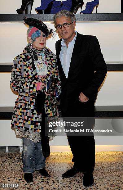 Anna Piaggi and Designer Giuseppe Zanotti attend Giuseppe Zanotti Design autumn-winter collection on February 27, 2010 in Milan, Italy.