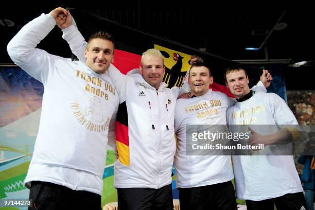 Germany 1 celebrate after winning the silver medal during the men's four man bobsleigh on day 16 of the 2010 Vancouver Winter Olympics at the...
