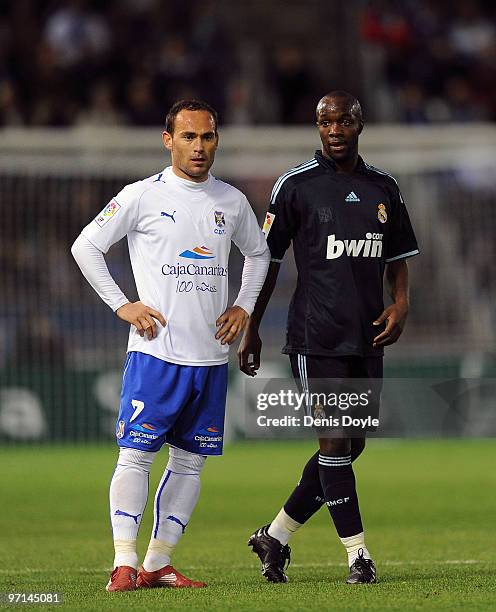 Nino of Tenerife and Lass Diarra of Real Madrid wait for play to resume during the La Liga match between Tenerife and Real Madrid at the Heliodoro...