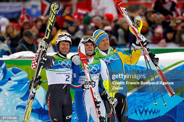 Giuliano Razzoli of Italy takes the Gold Medal, Ivica Kostelic of Croatia takes the Silver Medal, Andre Myhrer of Sweden takes the Bronze Medal...