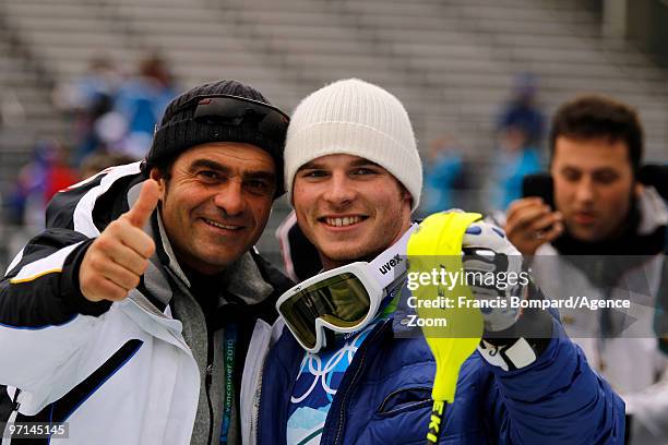 Giuliano Razzoli of Italy takes the Gold Medal and is congratulated by Alberto Tomba during the Men's Slalom on day 16 of the Vancouver 2010 Winter...