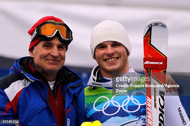 Giuliano Razzoli of Italy takes the Gold Medal and is congratulated by his father during the Men's Slalom on day 16 of the Vancouver 2010 Winter...