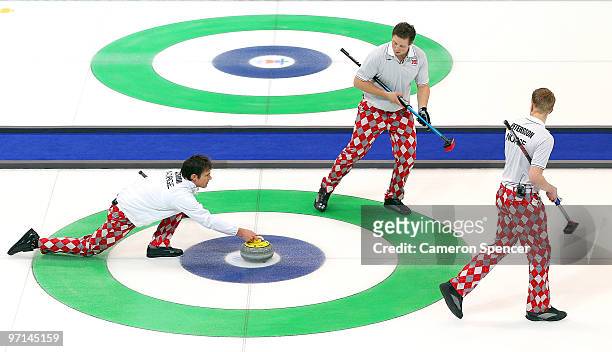 Thomas Ulsrud of Norway slides a stone down the ice during the Curling Men's Gold medal game between Canada and Norway on day 16 of the Vancouver...
