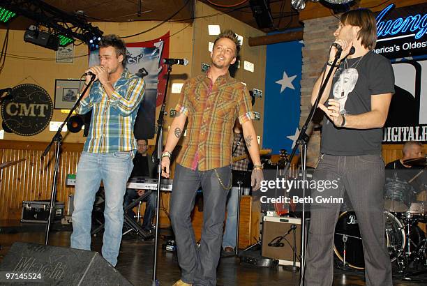 Eric Gunderson, Stephen Barker Lilies and and Brian Bandas of Love & Theft perform at the Guilty Pleasures show during the 2010 Country Radio Seminar...