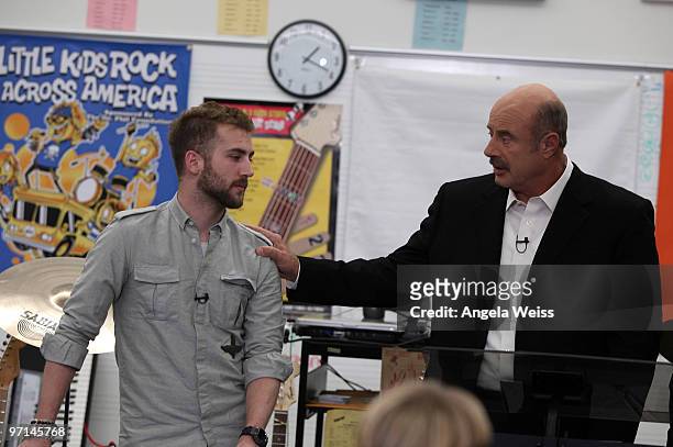 Jordan McGraw and Dr. Phil McGraw attend the Dr Phil & Kris Allen 'Little Kids Rock Across America' event at the Central Los Angeles High School for...
