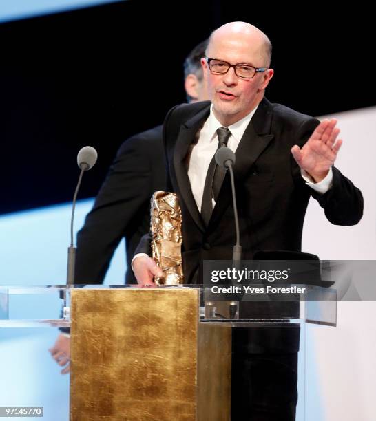 Director Jacques Audiard poses with his award for best movie 2010 for "Un Prophete" film after the show at the 35th Cesar Film Awards held at the...