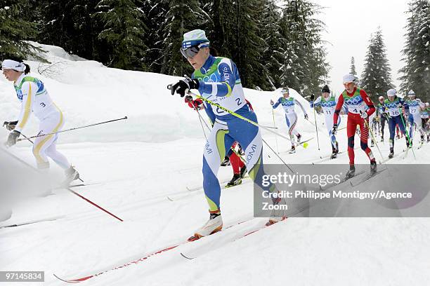 Aino-Kaisa Saarinen of Finland takes 3rd place during the ladies' 30 km mass start cross-country skiing classic on day 16 of the 2010 Vancouver...
