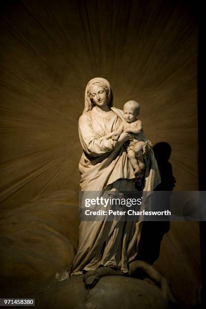 The Statue of the Madonna with child by artist, Jean-Baptiste Pigalle in the Chapel of the Madonna, or the Lady Chapel - La Chapelle de la Vierge -...