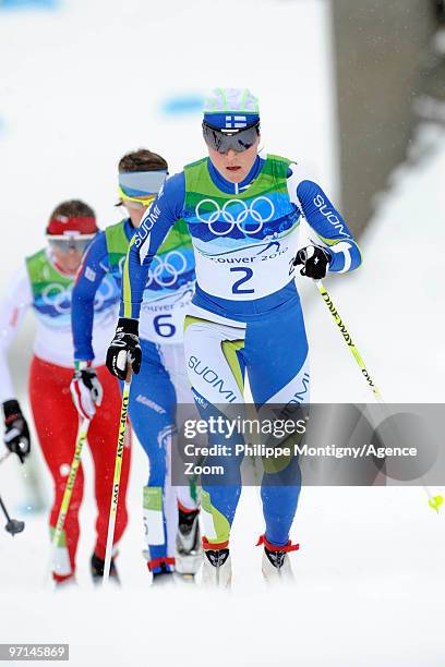 Aino-Kaisa Saarinen of Finland takes 3rd place during the ladies' 30 km mass start cross-country skiing classic on day 16 of the 2010 Vancouver...