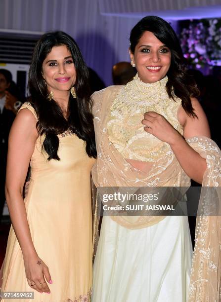 Indian Bollywood actress Sai Tamhankar and Richa Chdda attends the politician Baba Siddiques Annual Iftar party in Mumbai on June 10, 2018.