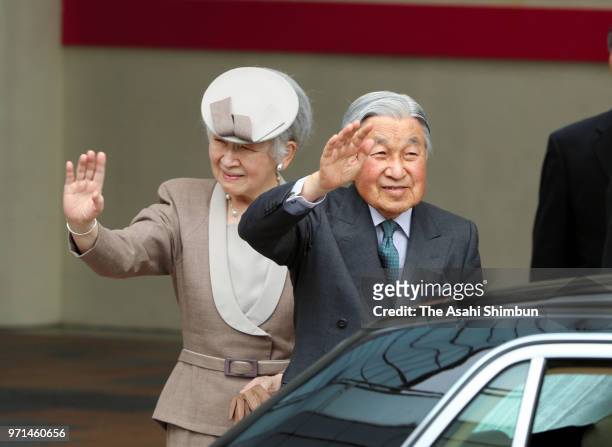 Emperor Akihito and Empress Michiko wave to well-wishers on arrival at JR Koriyama Station on June 9, 2018 in Koriyama, Fukushima, Japan. This 3-day...
