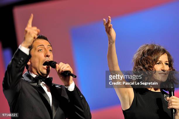 Hosts Gad Elmaleh and Valerie Lemercier perform on stage during the 35th Cesar Film Awards at the Theatre du Chatelet on February 27, 2010 in Paris,...