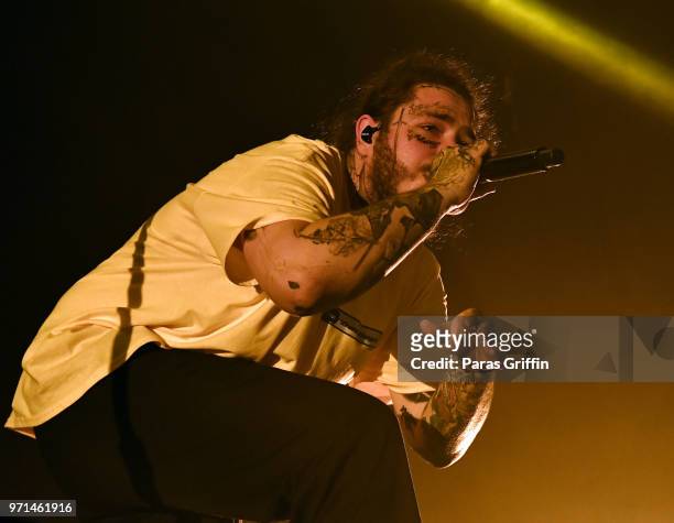 Rapper Post Malone performs onstage at The Cellairis Amphitheatre at Lakewood on June 10, 2018 in Atlanta, Georgia.