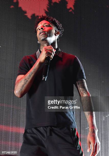 Rapper 21 Savage performs onstage at The Cellairis Amphitheatre at Lakewood on June 10, 2018 in Atlanta, Georgia.