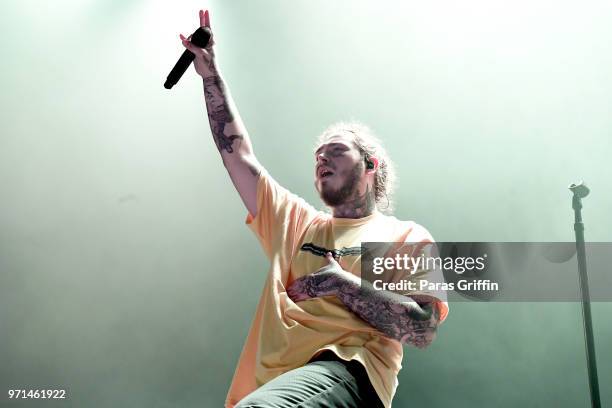 Rapper Post Malone performs onstage at The Cellairis Amphitheatre at Lakewood on June 10, 2018 in Atlanta, Georgia.