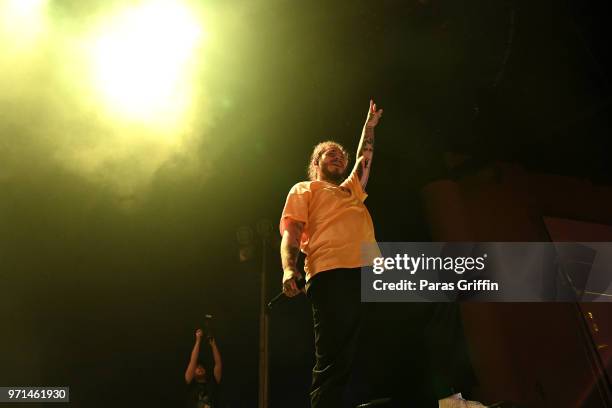 Rapper Post Malone performs onstage at The Cellairis Amphitheatre at Lakewood on June 10, 2018 in Atlanta, Georgia.