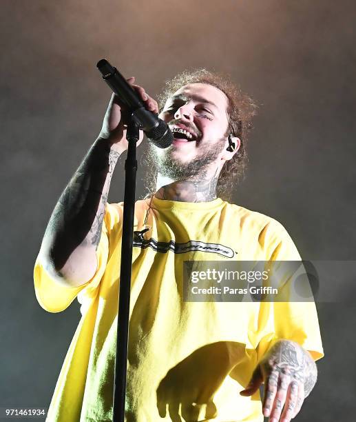 Rapper Post Malone performs onstage at The Cellairis Amphitheatre at Lakewood on June 10, 2018 in Atlanta, Georgia.