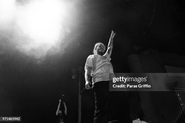 Rapper Post Malone performs onstage at The Cellairis Amphitheatre at Lakewood on June 10, 2018 in Atlanta, Georgia.