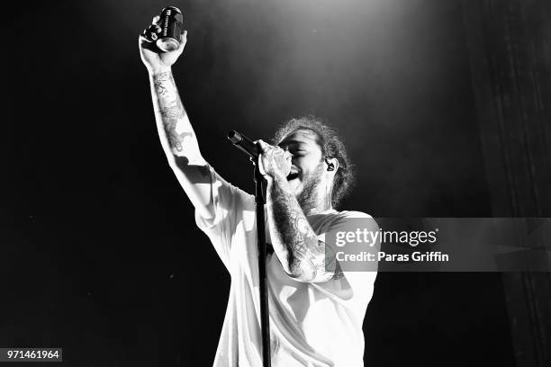 Rapper Post Malone performs onstage at The Cellairis Amphitheatre at Lakewood on June 10, 2018 in Atlanta, Georgia.