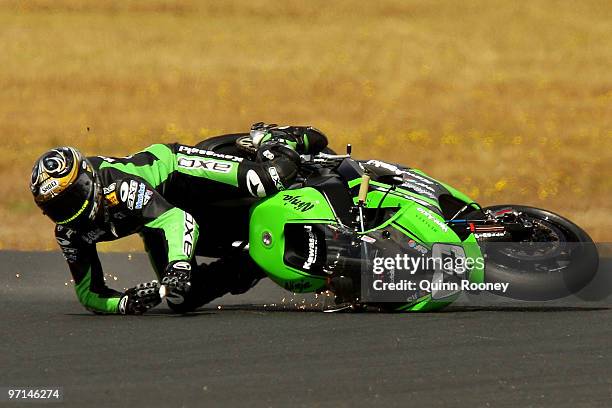 Chris Vermeulen of Australia and the Kawasaki Racing Team crashes during the Superbike World Championship round one race one at Phillip Island Grand...