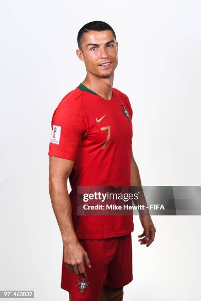 Cristiano Ronaldo of Portugal poses for a portrait during the official FIFA World Cup 2018 portrait session at the Saturn training base on June 10,...