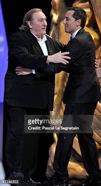 Actor Gerard Depardie and host Gad Elmaleh speak on stage during the 35th Cesar Film Awards at the Theatre du Chatelet on February 27, 2010 in Paris,...