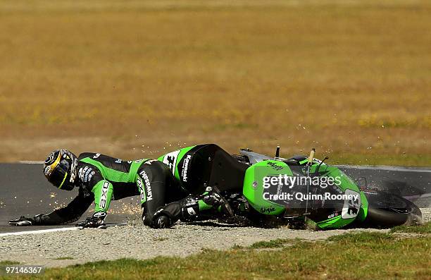 Chris Vermeulen of Australia and the Kawasaki Racing Team crashes during the Superbike World Championship round one race one at Phillip Island Grand...