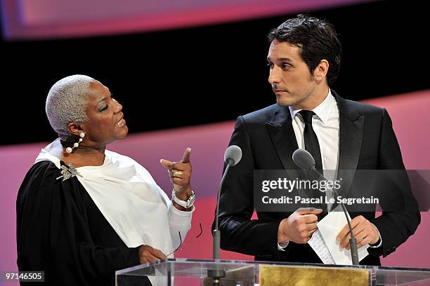 Firmine Richard and Pascal Elbe speak on stage during the 35th Cesar Film Awards at the Theatre du Chatelet on February 27, 2010 in Paris, France.