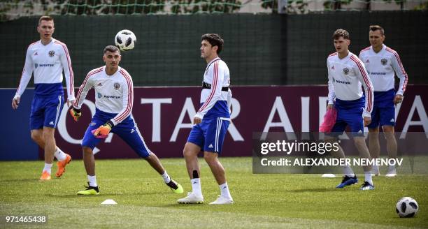 Players of the Russian national football team attend a training session in Novogorsk outside Moscow on June 11 ahead of the Russia 2018 World Cup.