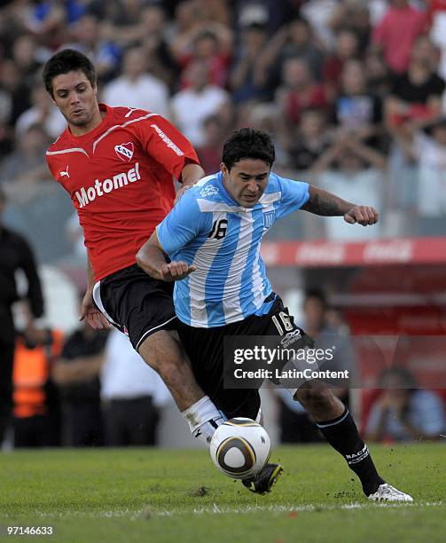 Leonel Galeano of Independiente vies for the ball with Claudio Bieler of Racing during their match as part of the Clausura 2010 on February 27, 2010...
