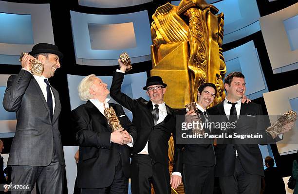 Part of the team of the movie 'Un Prophete" pose after the show of the 35th Cesar Film Awards held at the Theatre du Chatelet on February 27, 2010 in...