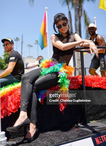 Actress Tina Desai poses on the Netflix original series 'Sense8' float at the LA Pride Parade 2018 on June 10, 2018 in West Hollywood, California.