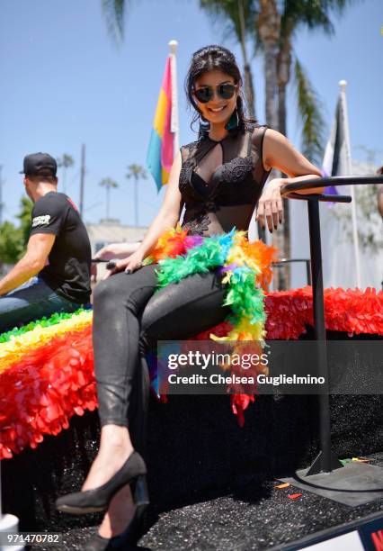 Actress Tina Desai poses on the Netflix original series 'Sense8' float at the LA Pride Parade 2018 on June 10, 2018 in West Hollywood, California.