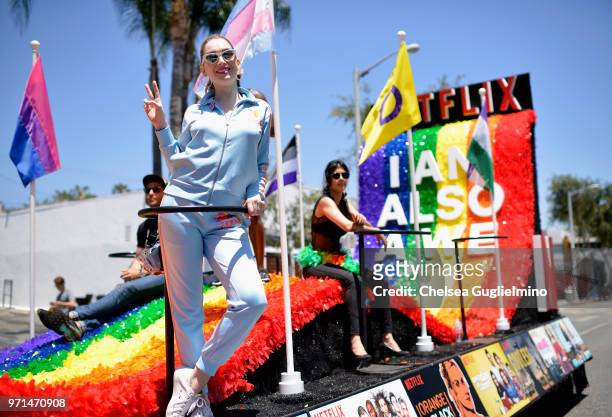 Actors Jamie Clayton and Tina Desai pose on the Netflix original series 'Sense8' float at the LA Pride Parade 2018 on June 10, 2018 in West...