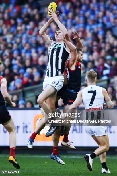 Mason Cox of the Magpies marks the ball during the round seven AFL match between the Western Bulldogs and the Gold Coast Suns at Mars Stadium on May...